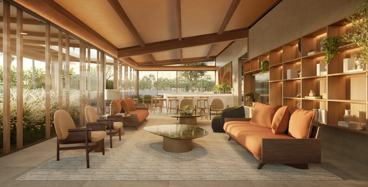 Lounge do clube do Artesano Campo Grande, com mobiliário em tons terrosos